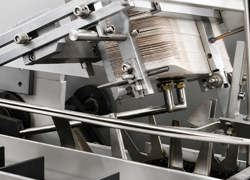 AIPAK’s Pneumatic Carton Feed System