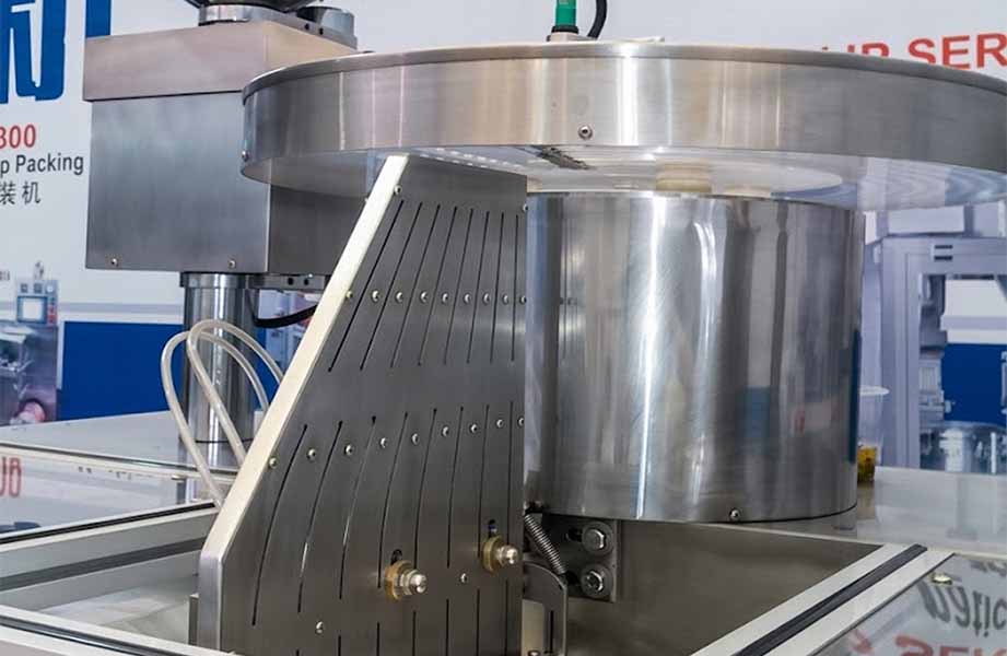 Vibratory Feeding with Broken-Tablet Screening