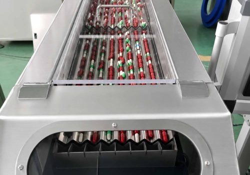 Fully Enclosed Vibrating Track Design