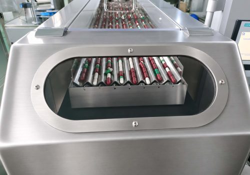 Fully Enclosed Vibrating Track Design